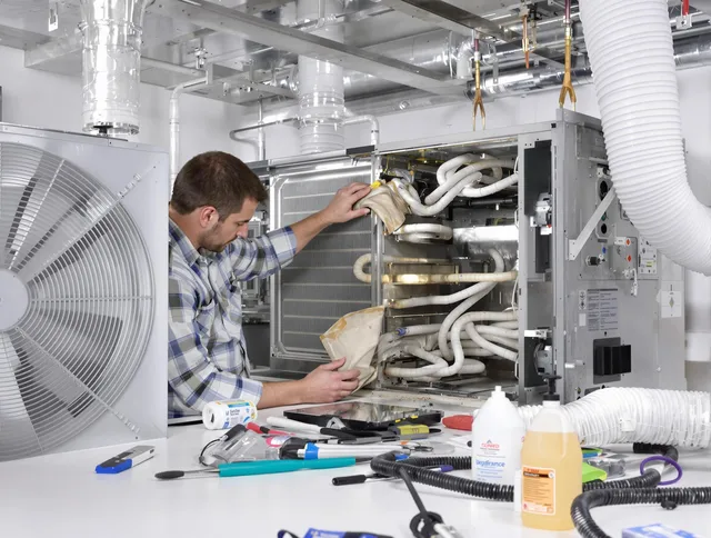 Acushnet Air Duct Cleaning specialist performing precision AC coil cleaning in Acushnet