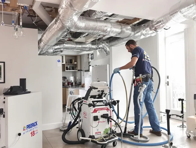 Acushnet Air Duct Cleaning technician performing advanced pure duct cleaning with specialized equipment in Acushnet